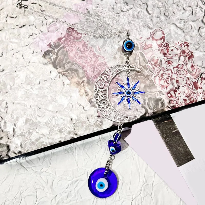 Crystaluck Celestial Themed Evil Eye Keychain with Moon, Sun & Heart Crystaluck Crystal Keychain for everyday carry, protection and gift giving