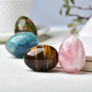 Crystaluck natural crystal egg 35mm x 50mm, hand-carved gemstone carving, front view